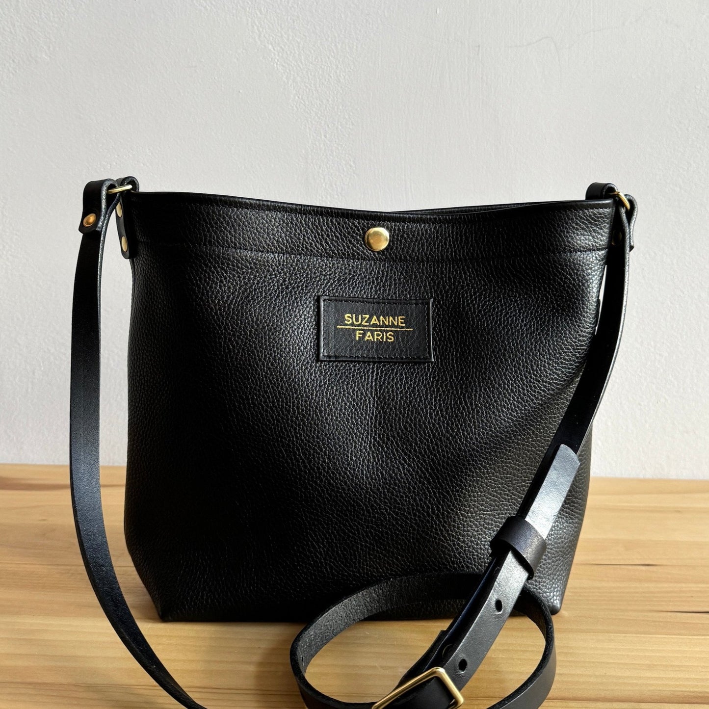 black leather snap bag crossbody