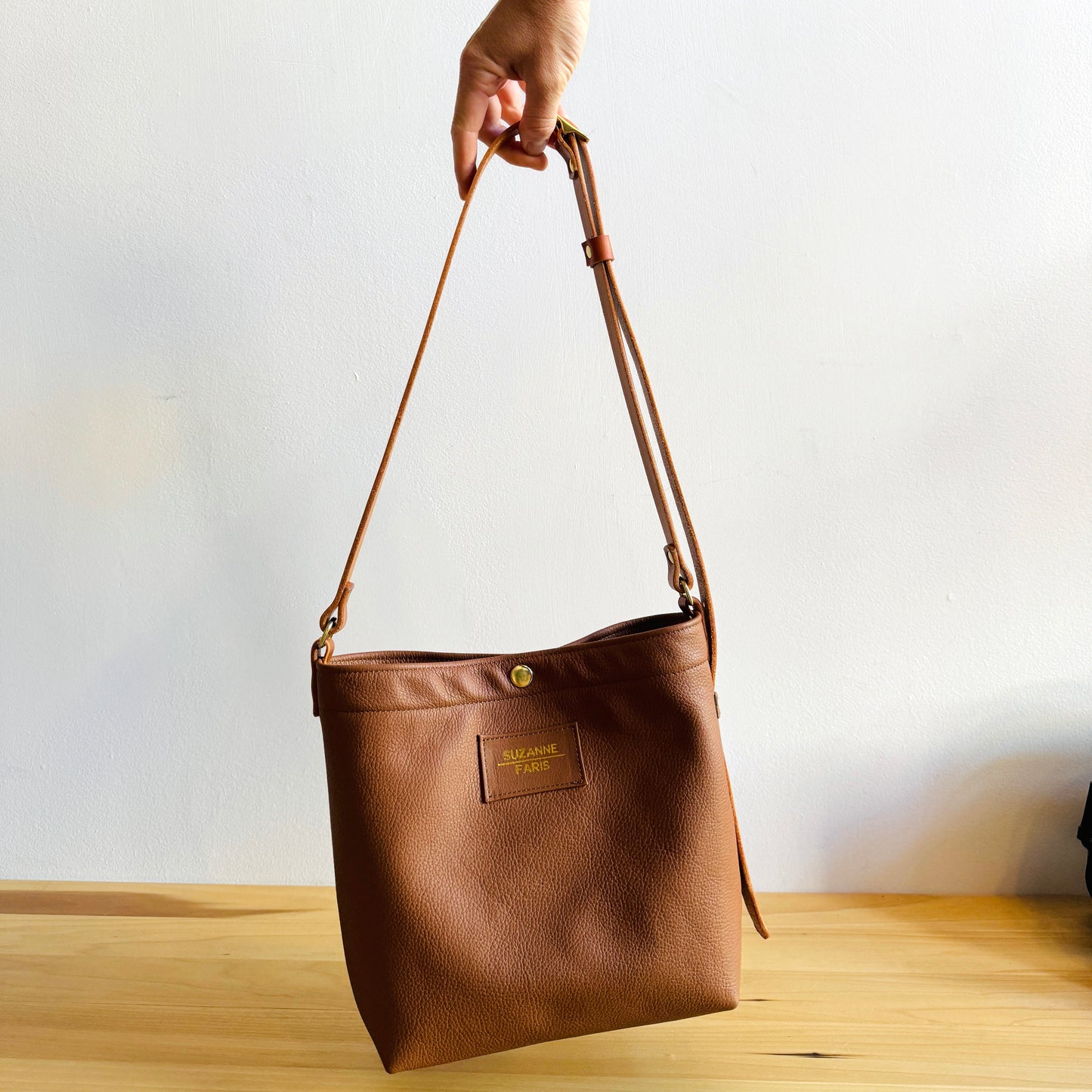 Tan leather snap bag crossbody