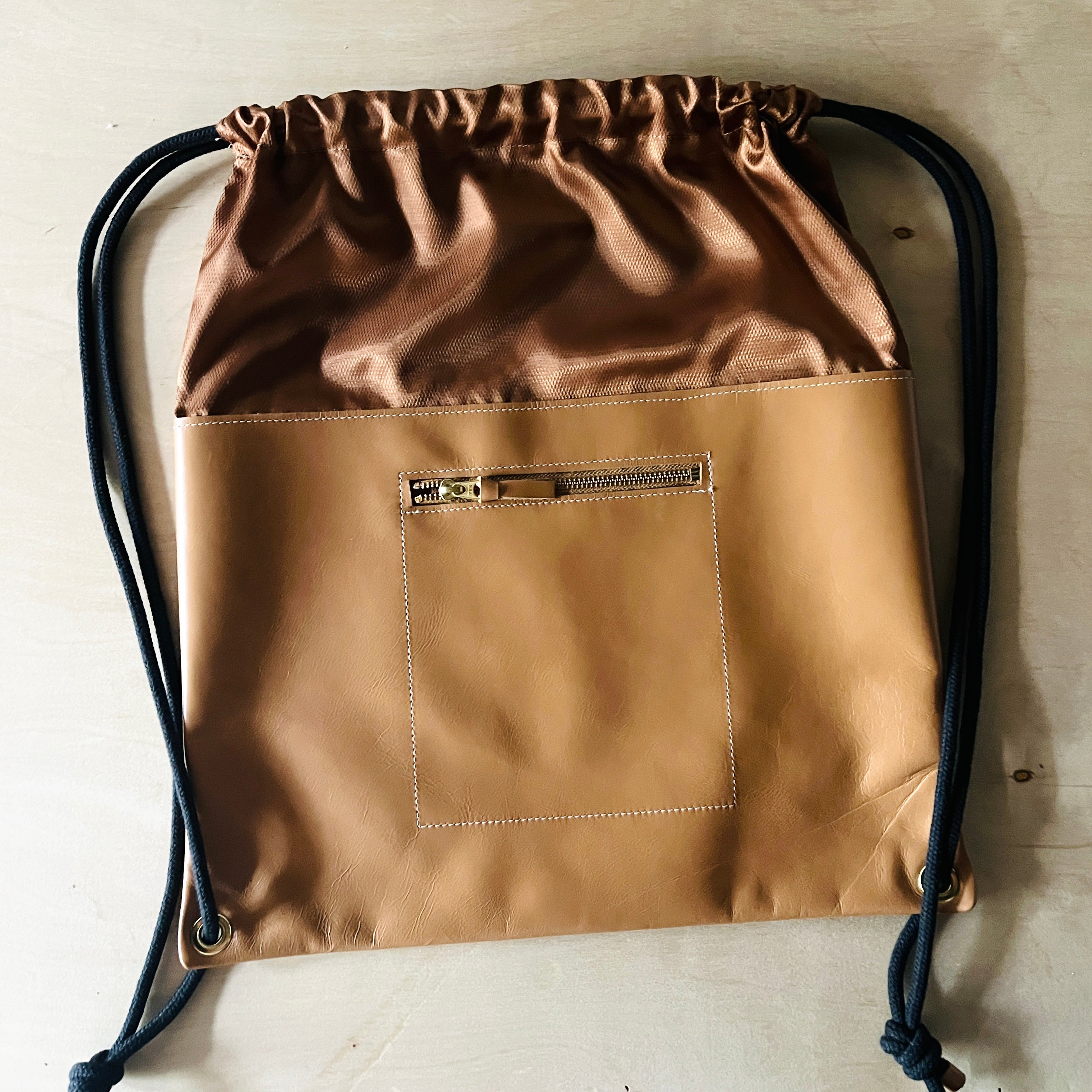 Brown leather 2024 drawstring backpack