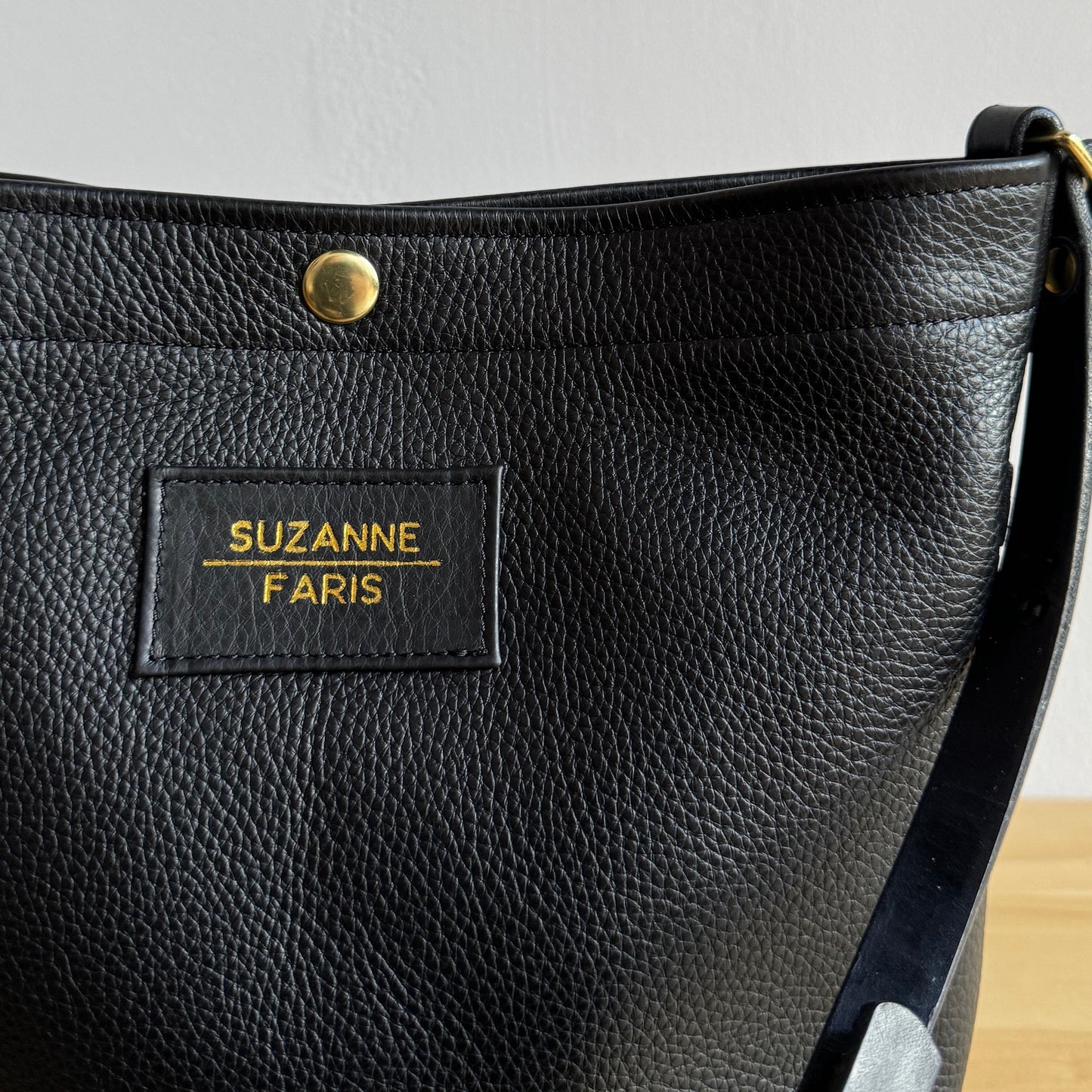 black leather snap bag crossbody