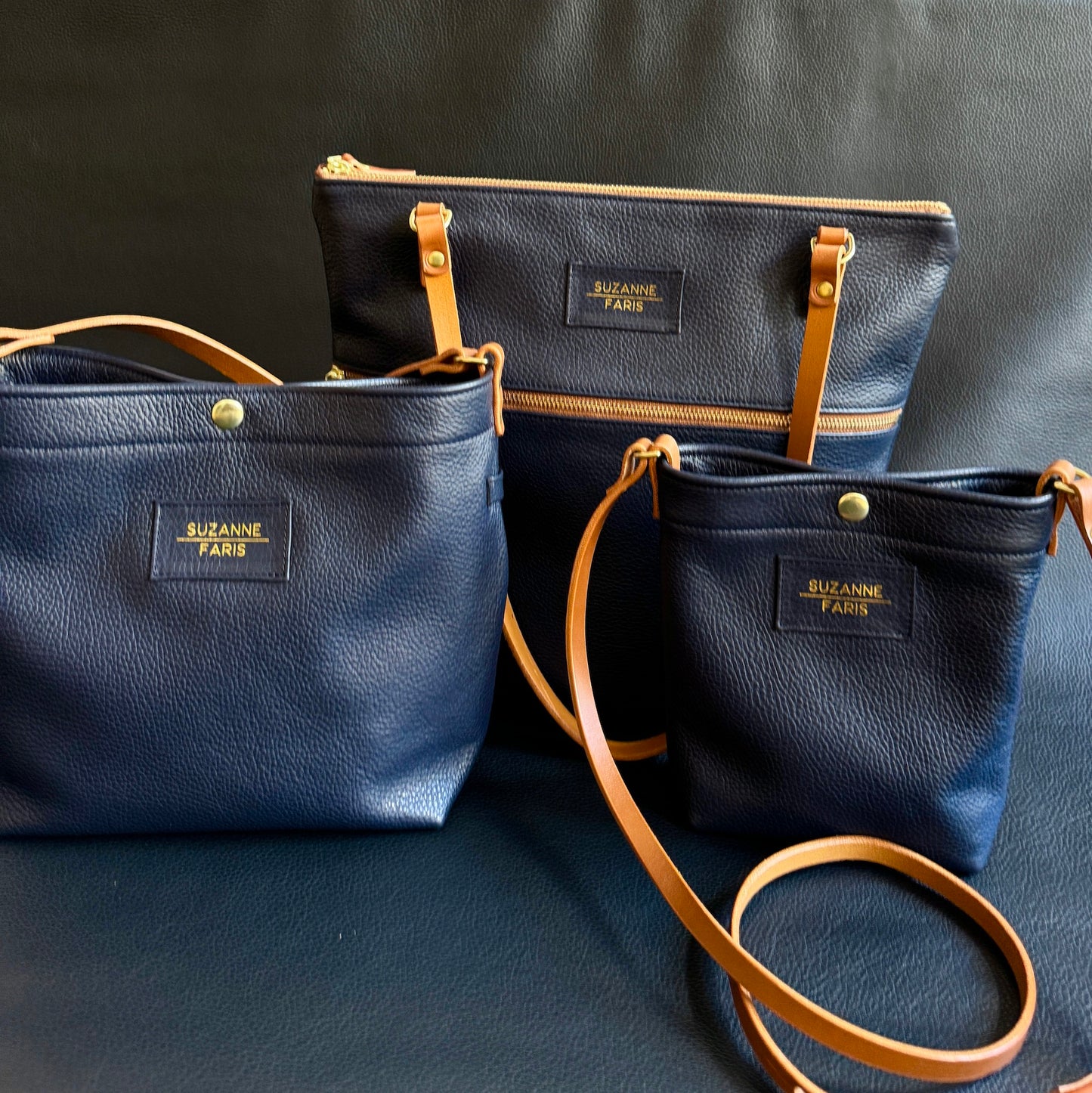 Navy leather handbag collection